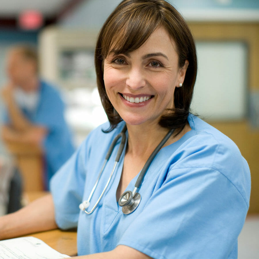 Hospital personnel smiling at the camera