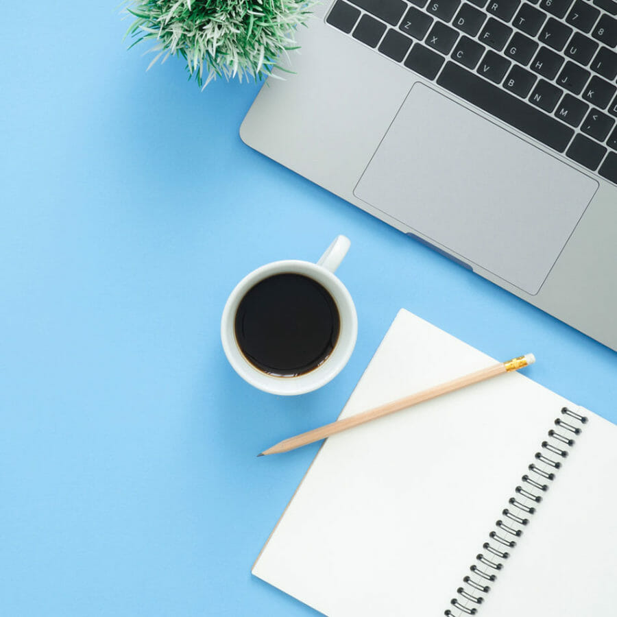 Writing desk with pen and paper