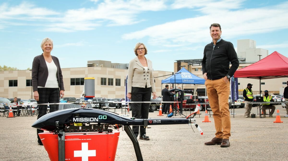 Susan Gunderson, Sara Criger and Scott Plank pose for a photo post-flight.