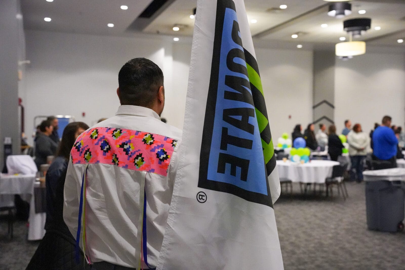 photo of conference room with Donate Life Flag in foreground.